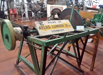 Atlas Lumber Company milling machine. See this in our Agriculture Room.