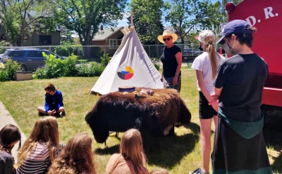 Carolyn Wagner, a member of the Blackfoot Tribe set up a child's teepee in the front yard on Monday June 21 (Aboriginal Day). Students from Westglen Middle School enjoyed the interactive presentation.